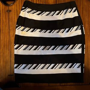 White House Black Market pencil skirt with horizontal color block detailing.